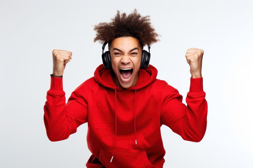 Happy Young black man headphones sweatshirt shouting.