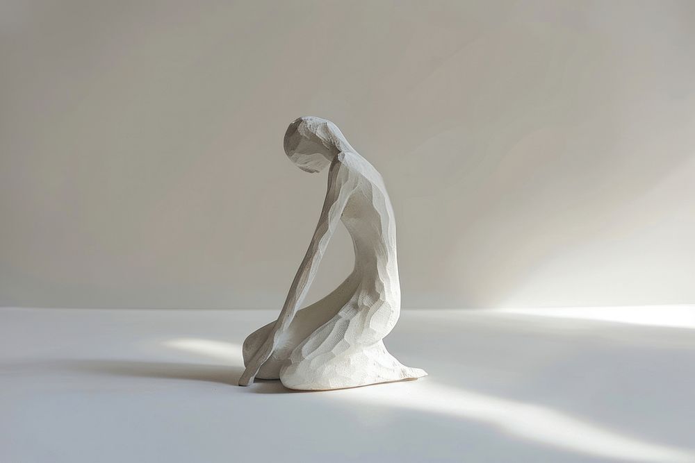 A sculpture woman white art representation.