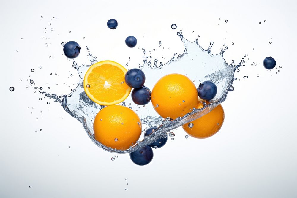 Blueberry and orange floating falling fruit lemon.