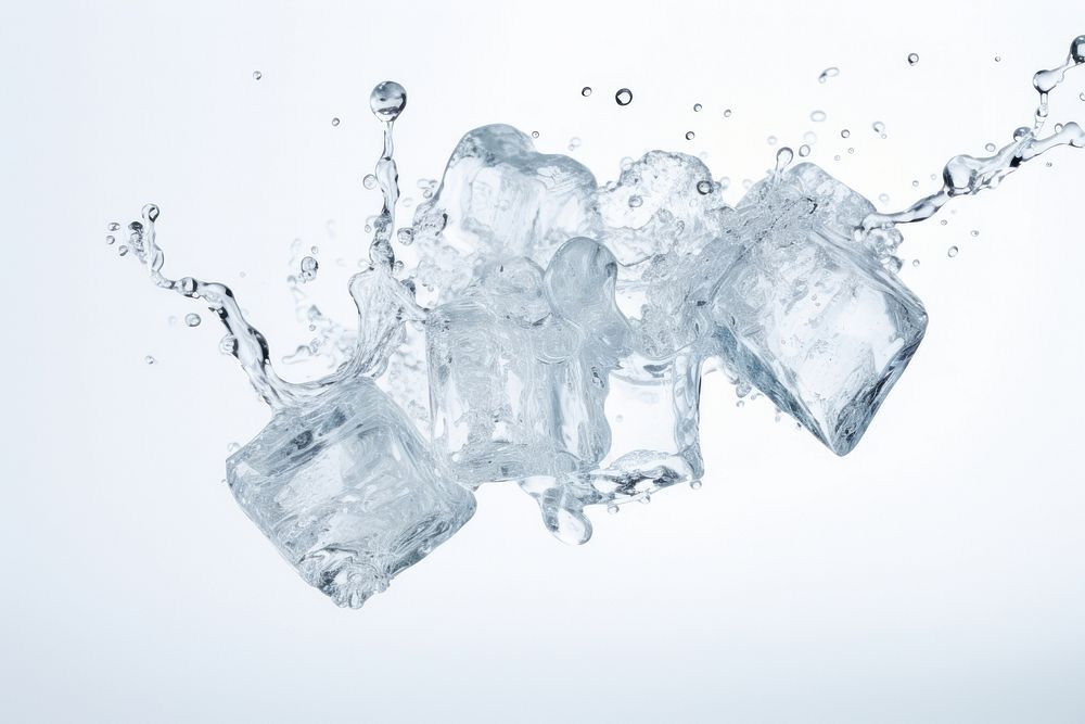 Ice cube with splash falling refreshment splattered.