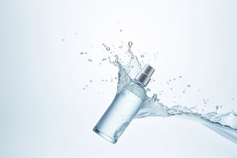 Minimal blue Skincare bottle with splash perfume falling refreshment.