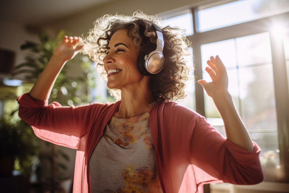 Woman in her 50s headphones adult electronics.
