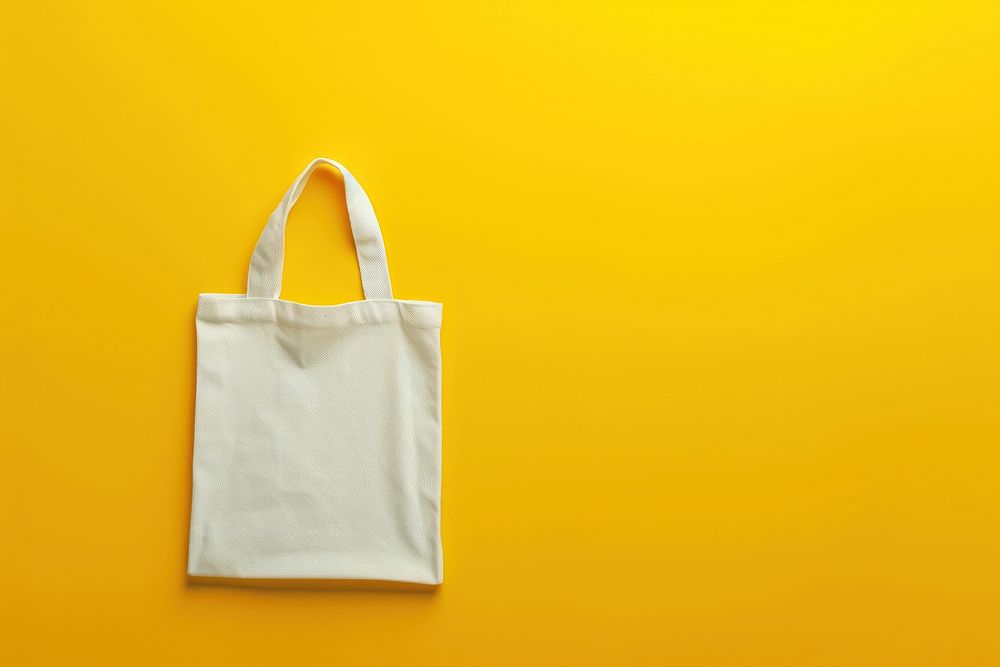Tote bag packaging  handbag yellow yellow background.