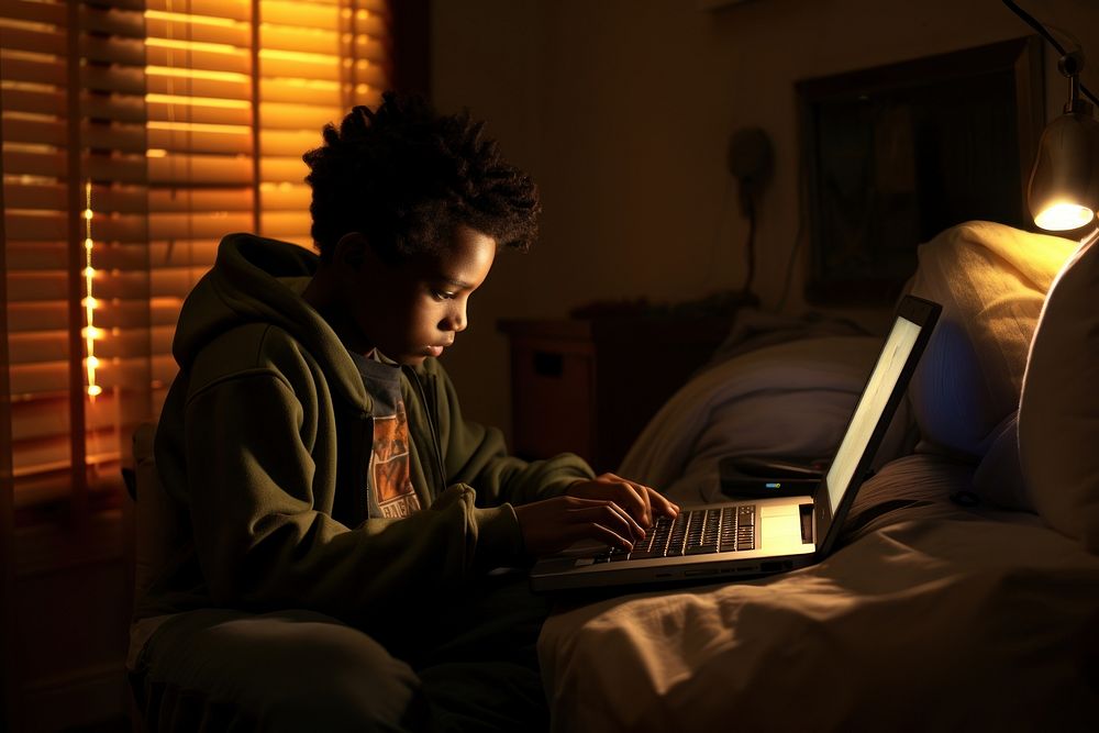 African kid computer furniture working.