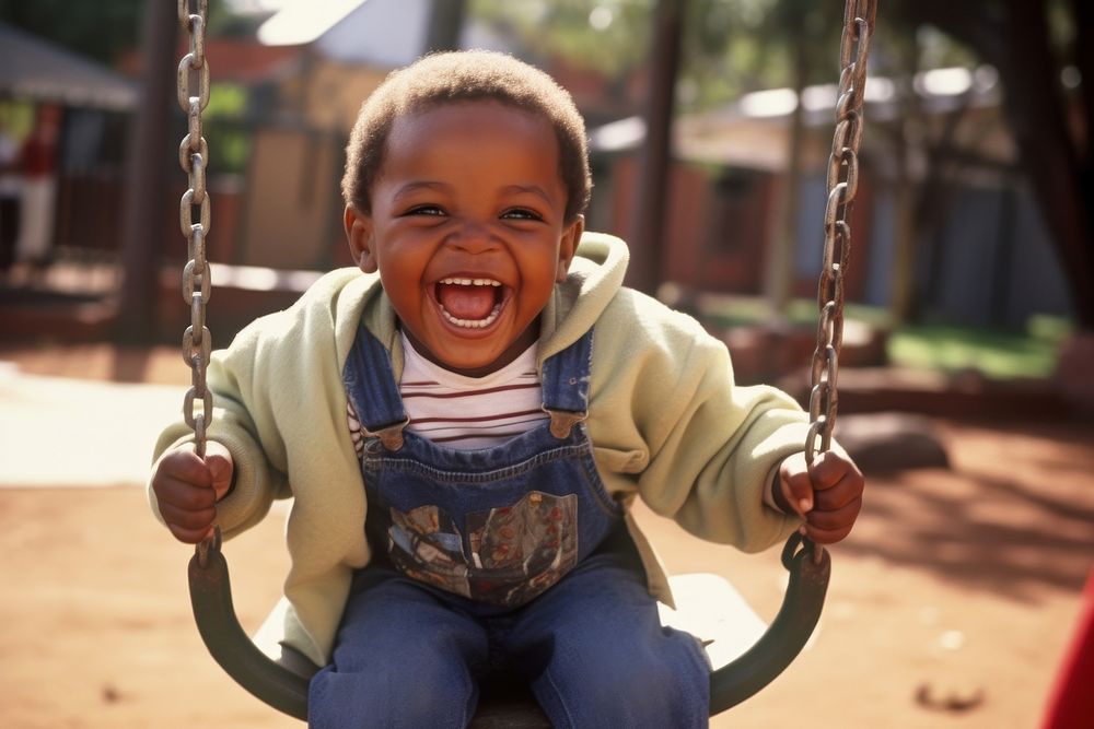 South African kid playground laughing portrait.