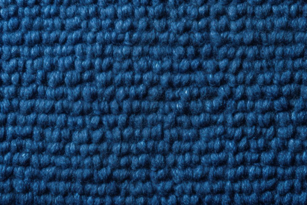 Blue wool carpet backgrounds material flooring.
