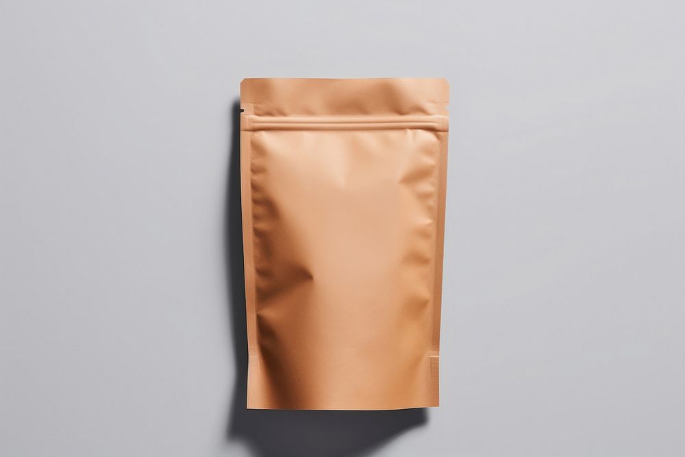 Paper coffee pouch packaging  brown clothing apparel.