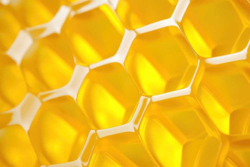 A yellow hexagon shaped pattern plastic bubble wrap honeycomb backgrounds repetition.