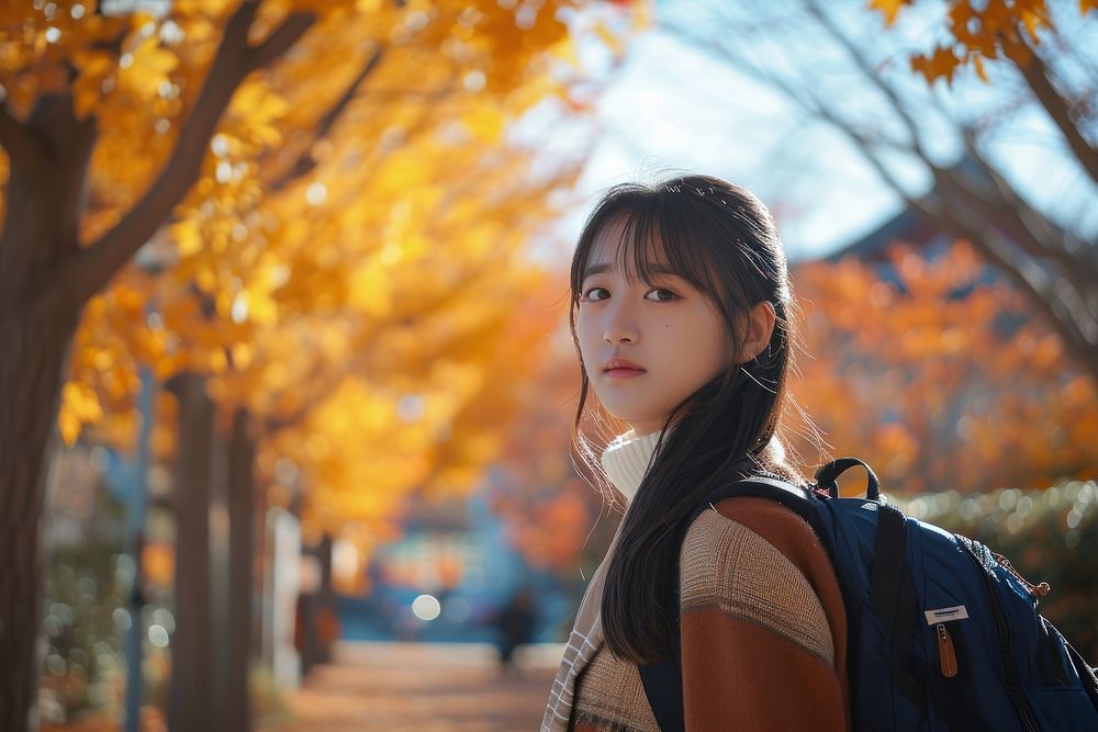 Korean student photo autumn contemplation architecture.