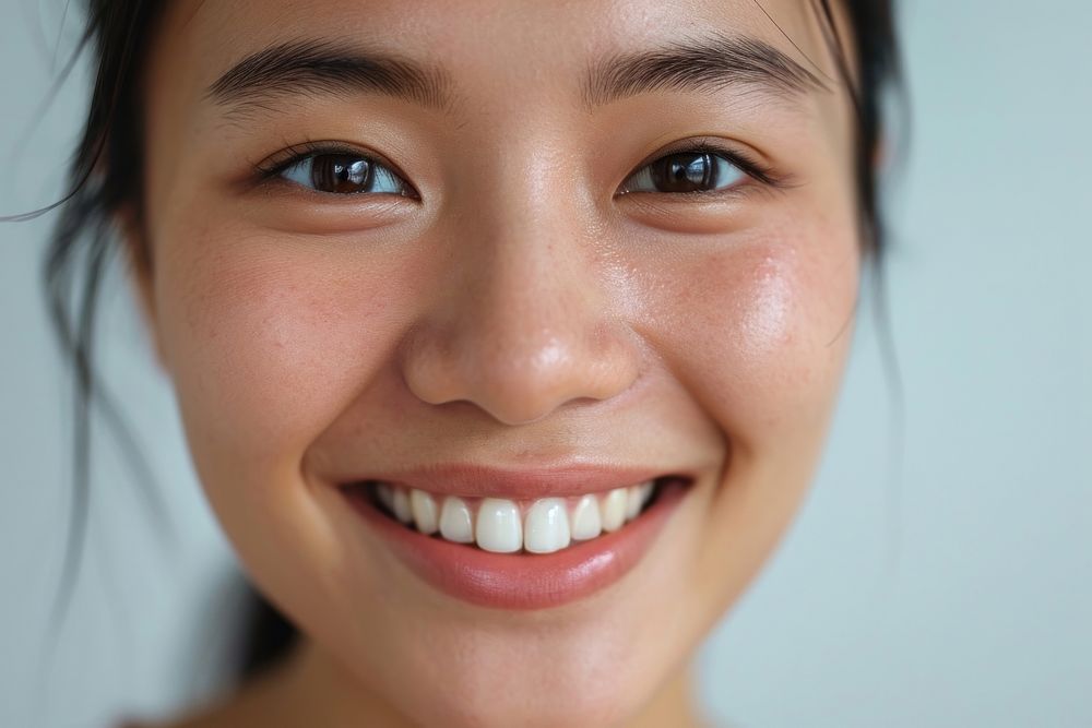 Close up south east asian woman no make up smile skin hairstyle.