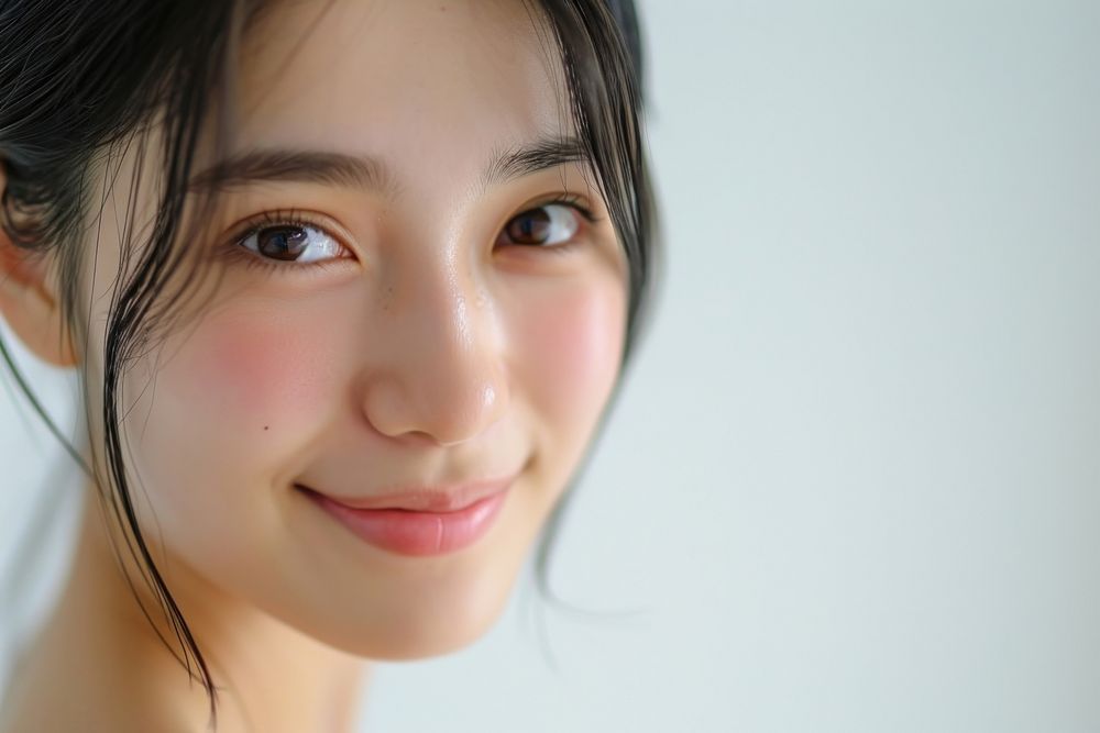 Close up south east asian woman no make up skin smile hairstyle.