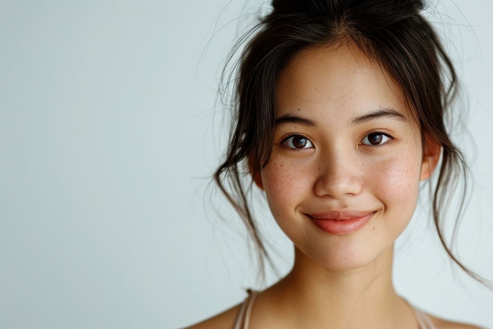 Close up south east asian woman no make up smile skin portrait.