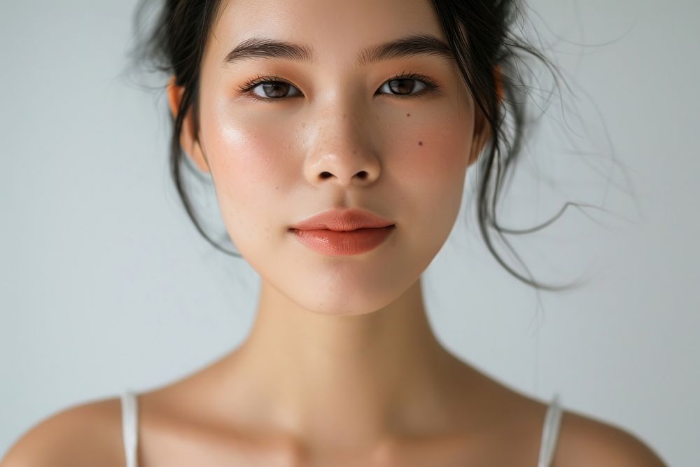 Close up south east asian woman no make up skin adult contemplation.