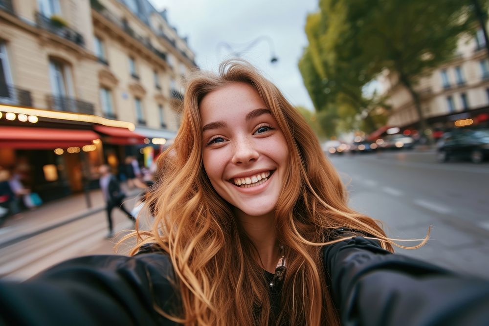 Happy young woman taking selfie portrait adult smile.