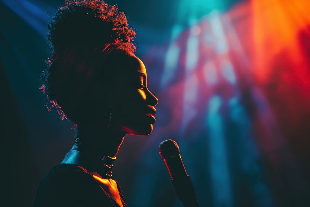 Black lady speak on the stage microphone light adult.