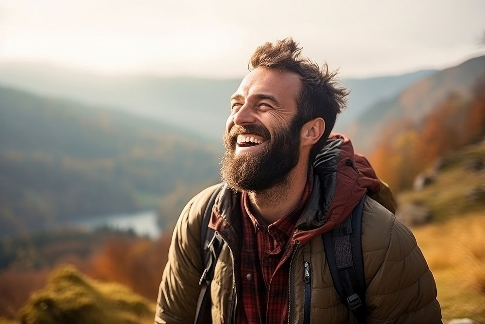 Middel eastern man hiking mountain smiling autumn.