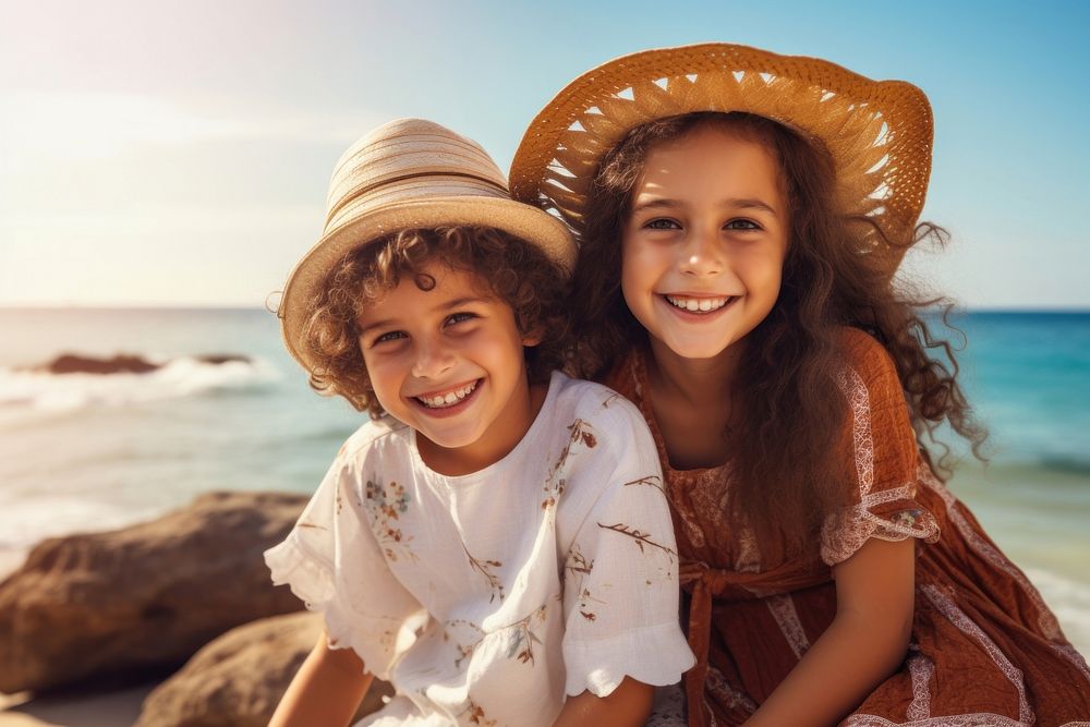 Middle eastern woman boy and girl enjoying summer at the beach smiling child happy.