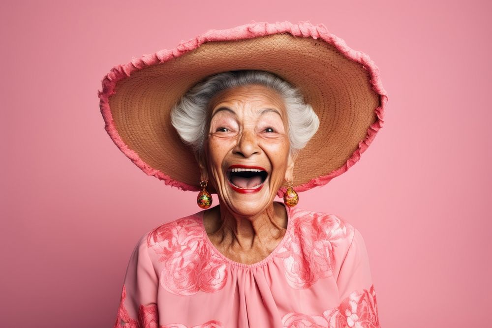 Mexican senior woman laughing adult studio shot.