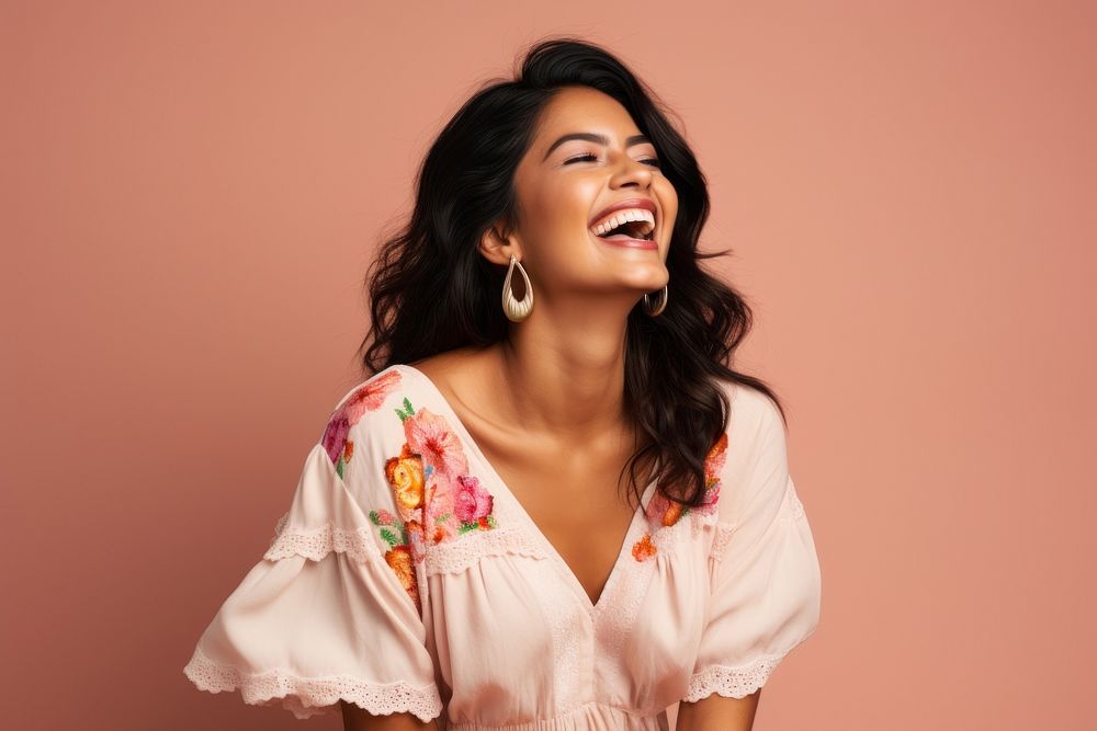 Mexican woman laughing blouse smile.