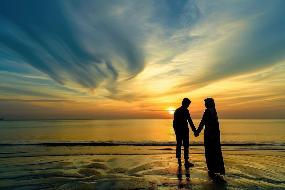 Romantic Qatari couple traveler outdoors nature sunset.