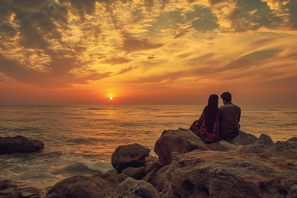 Romantic Qatari couple traveler outdoors sunset nature.