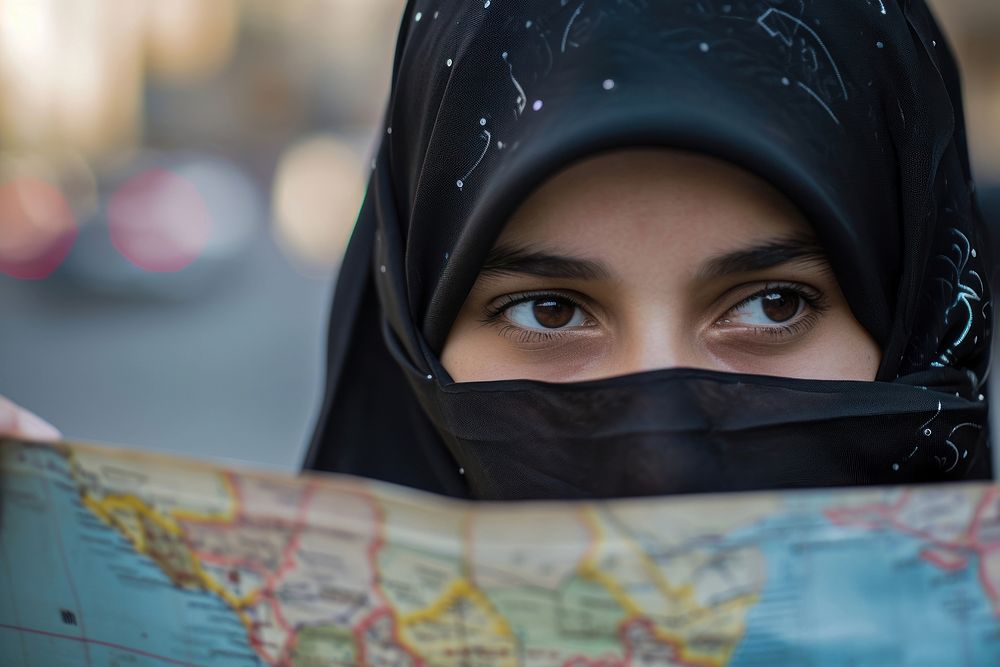 Saudi Arabia girl looking for direction city architecture headscarf.