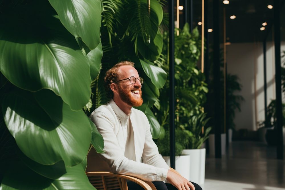 Plant shop sitting smile adult. AI generated Image by rawpixel.