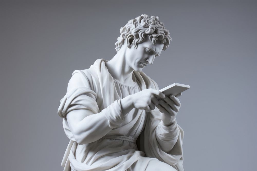 A sculpture of man holding smart phone statue marble representation.