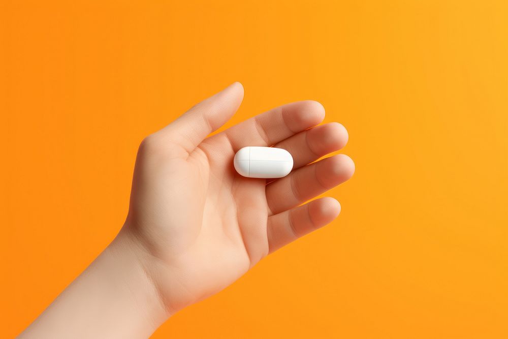 Pill holding hand medication. AI generated Image by rawpixel.