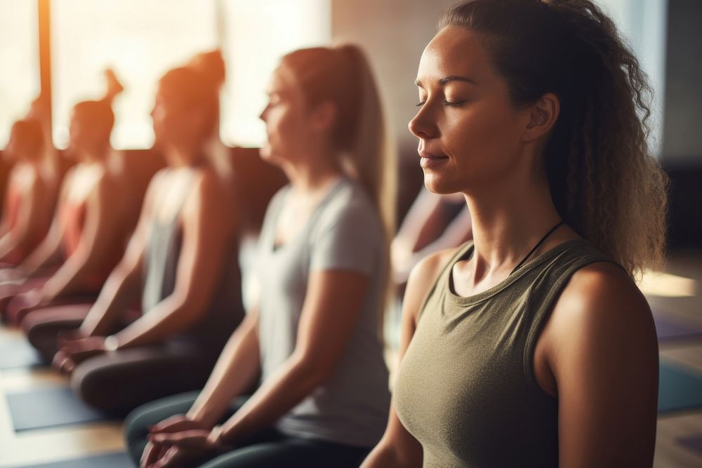 People in a yoga class meditating sports person adult. AI generated Image by rawpixel.