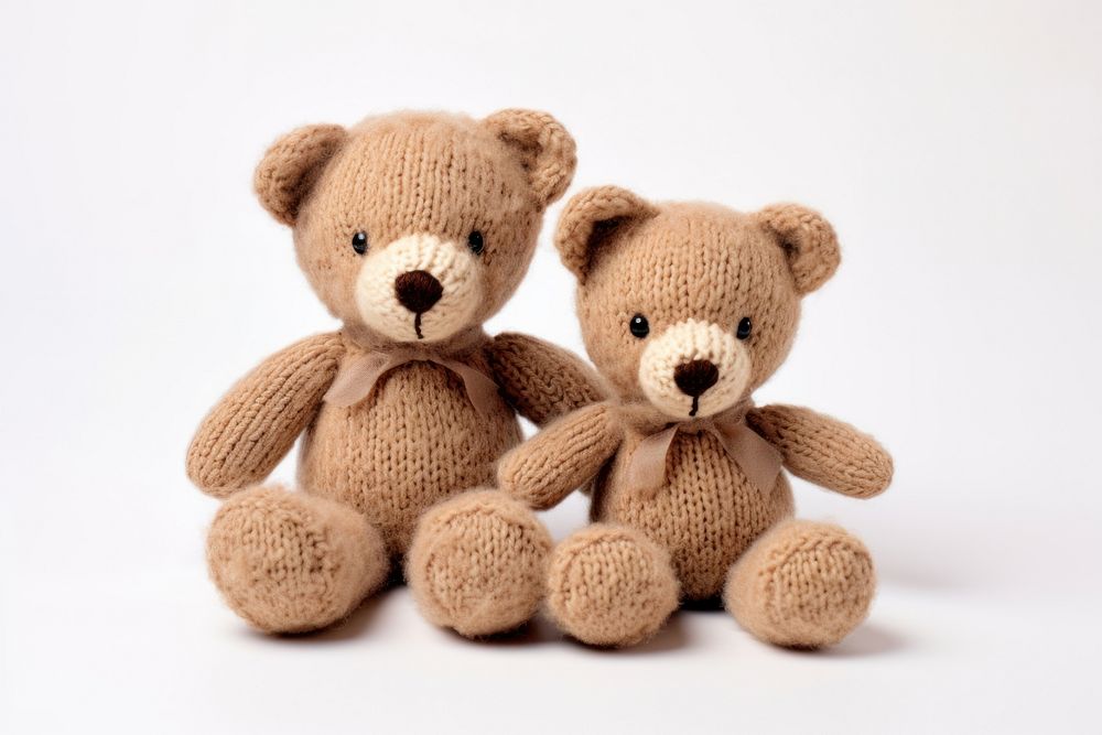 2 teddy bear in embroidery style textile plush toy.