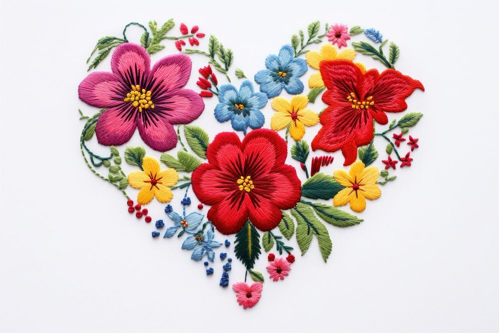 Heart with flower in embroidery style needlework pattern creativity.