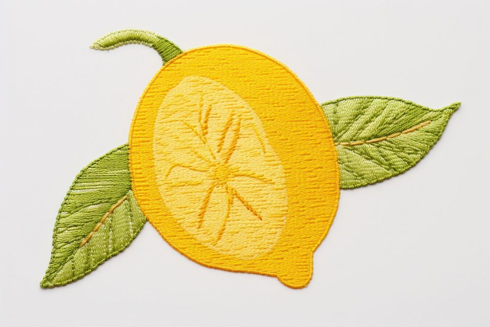Lemon in embroidery style pattern textile fruit.
