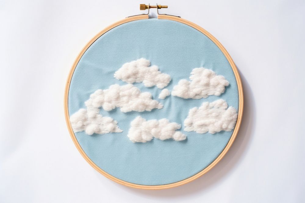 Sky in embroidery style pattern textile white.