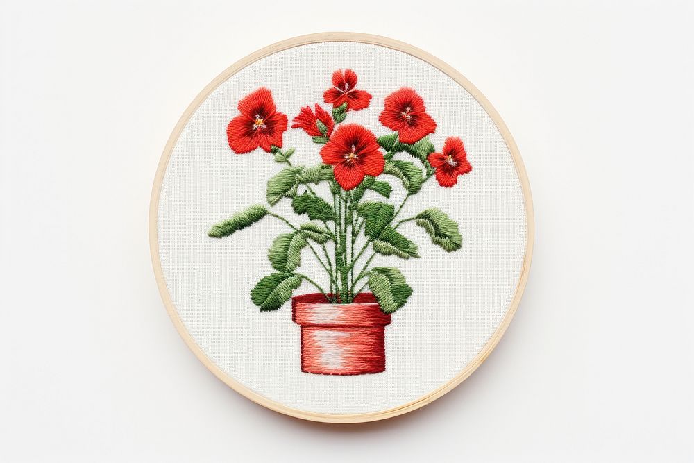 Potted plant in embroidery style needlework pattern flower.