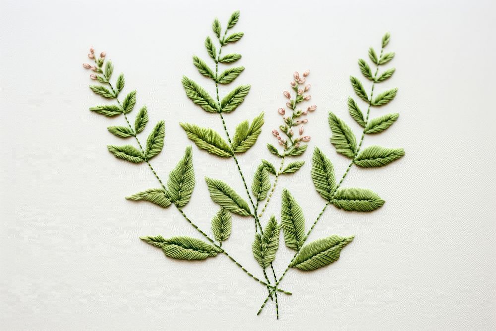 Plant in embroidery style pattern herbs leaf.