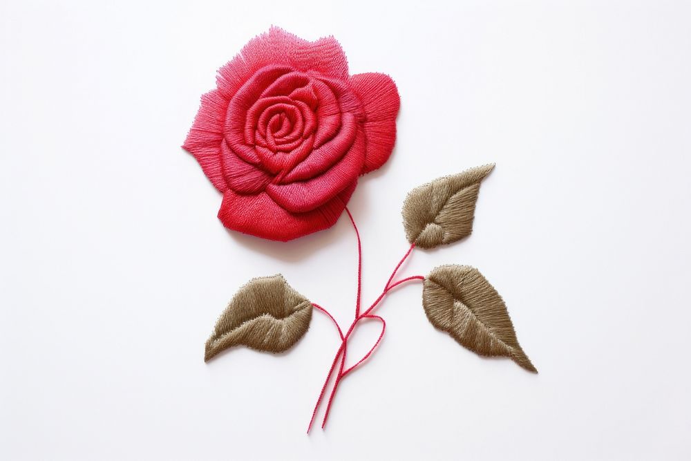 Rose in embroidery style textile pattern flower.
