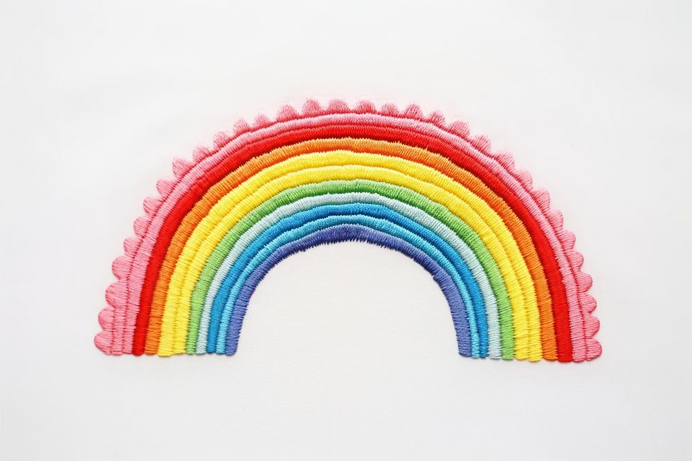 Rainbow in embroidery style textile art creativity.