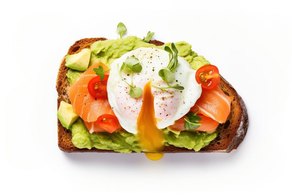 Poached egg with salmon and guacamole on rye bread food white background poached egg.