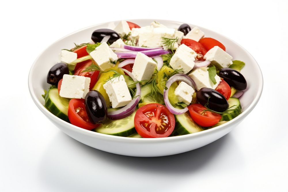 Salad with fresh vegetables olives tomatoes red onion greek cheese feta and olive oil salad plate food.