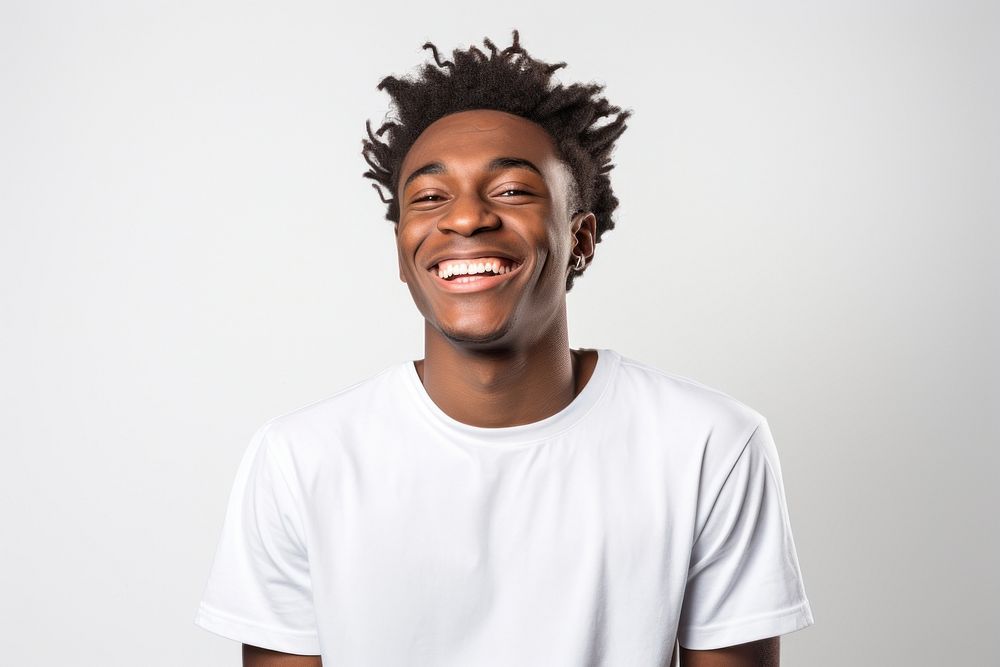 Teenager of a handsome black man smiling laughing smile white.