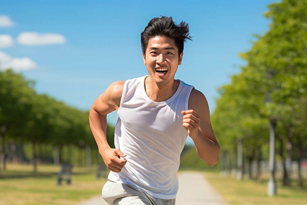 Young asian man running jogging adult day. AI generated Image by rawpixel.