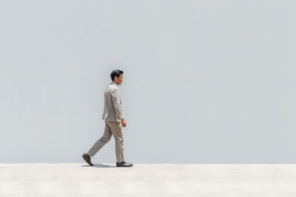 Asian man person walking standing footwear adult.