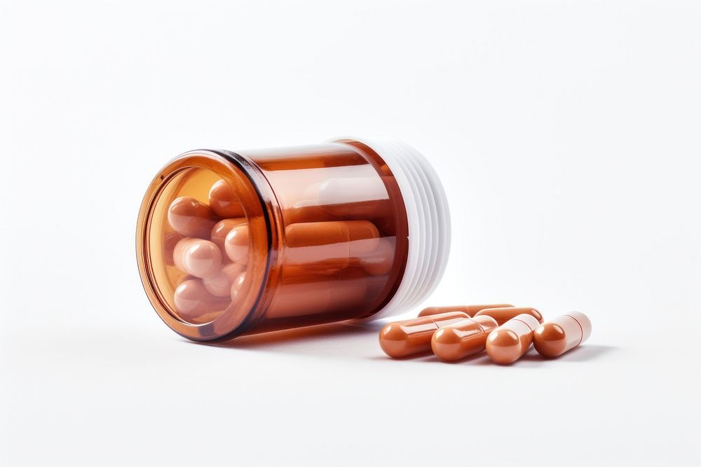 Capsule medicine brown pill white background. AI generated Image by rawpixel.