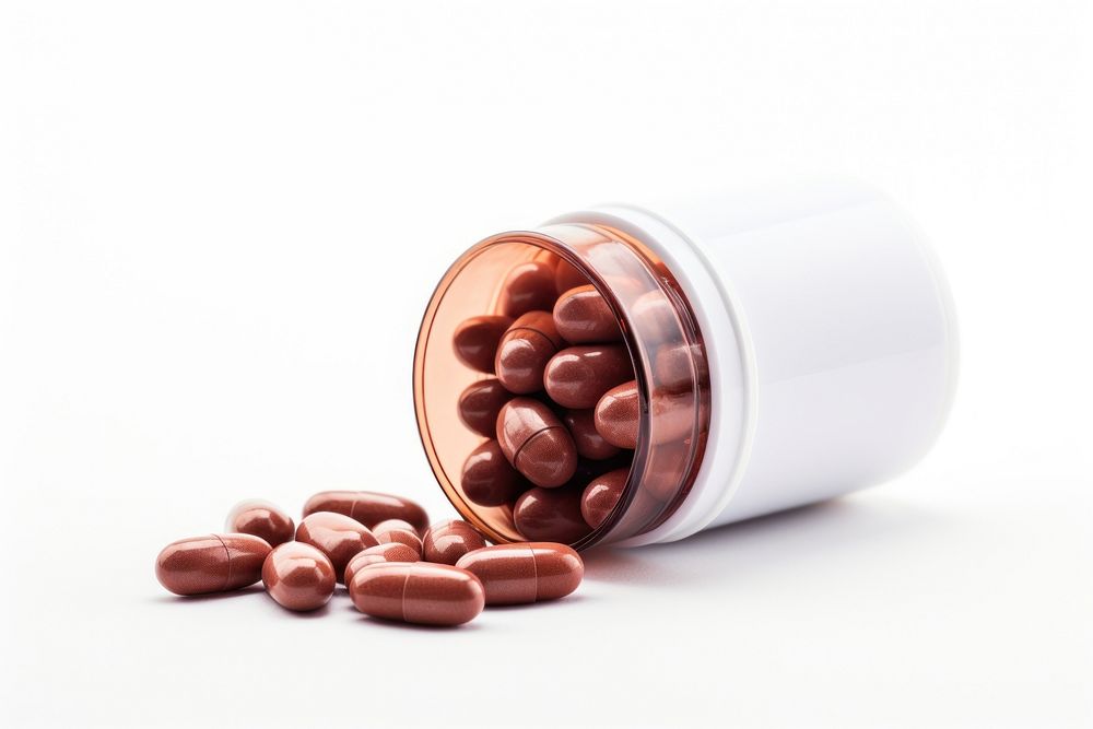 Capsule medicine brown pill tin. AI generated Image by rawpixel.