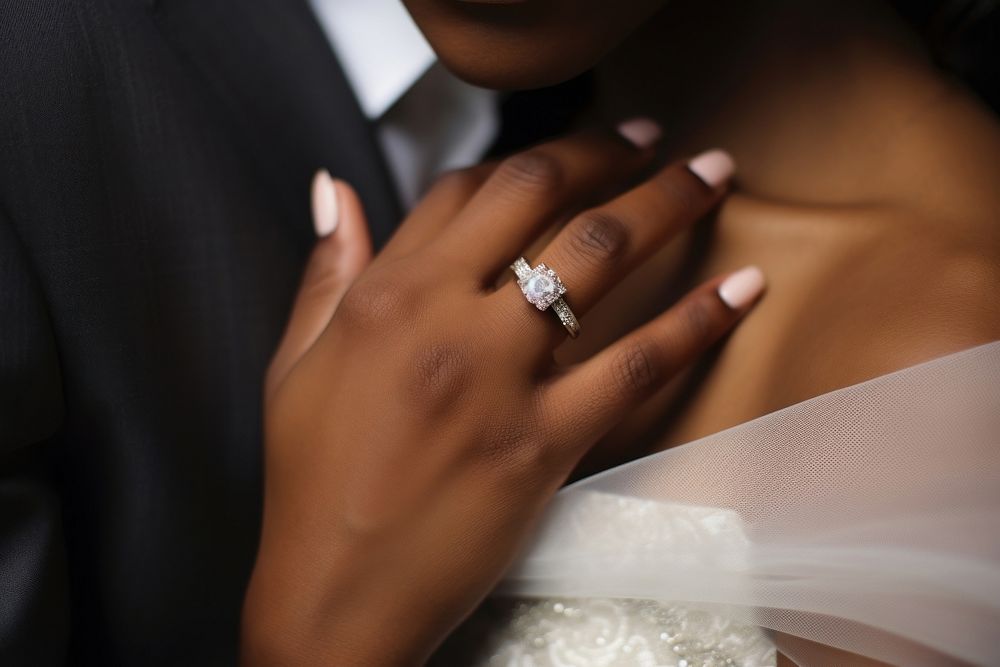 Black people wedding diamond ring hand.