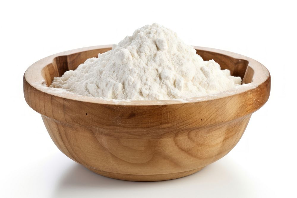 Flour in a wooden bowl powder white food.