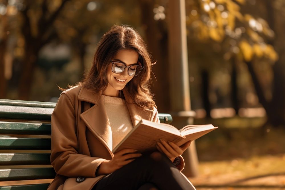 Woman glasses reading sitting. AI generated Image by rawpixel.