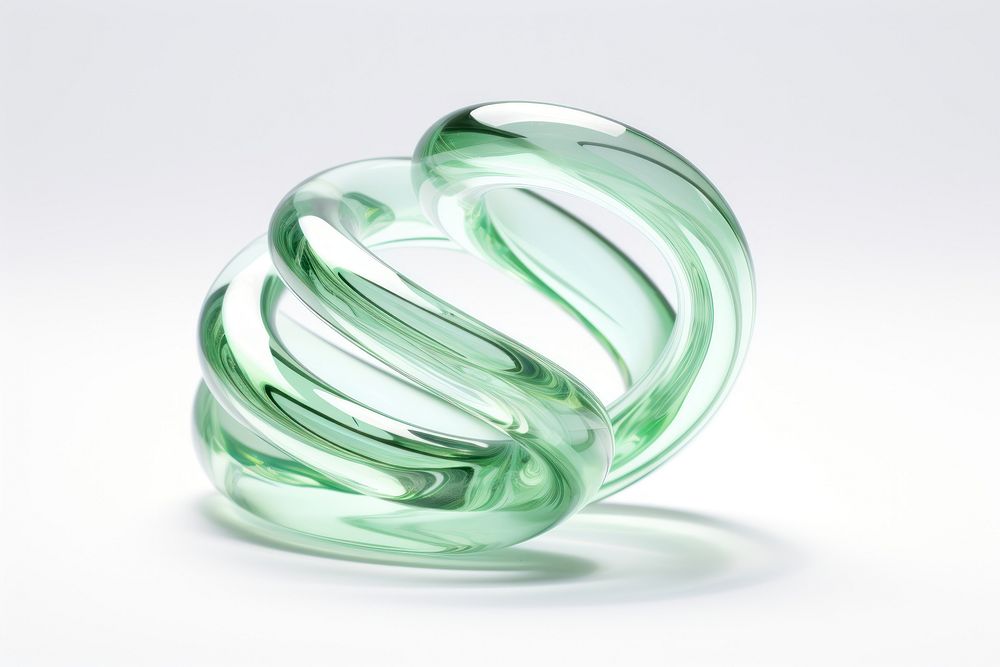 Spring coil shape jewelry glass white background.