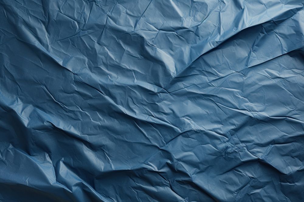 Blue paper Wrinkled blue backgrounds.